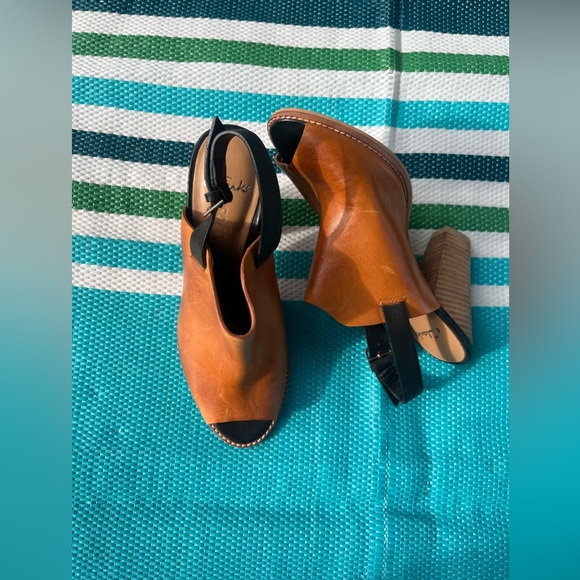 Clarks Shoes - Clarks Brown Leather Open Toed Wedged Heels with Sleek and Stylish Design